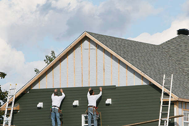 Professional Siding technician working in Akron, NY